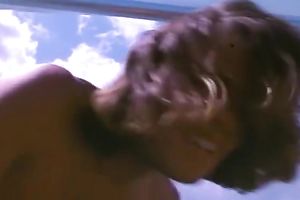 Sizzling bosomy brunette enjoys riding a weenie on a yacht