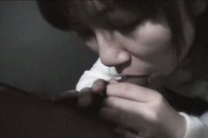 Asian doxy works on her BF's prick in a public throne-room