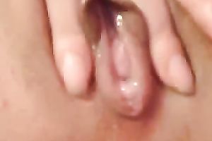 Asian beauty enjoys toying her soaked cum-hole in front of a web camera