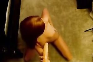 Bodacious nympho sucks her suction cup fake penis like crazy