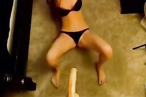 Bodacious nympho sucks her suction cup fake penis like crazy
