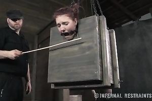 Hornifying redhead whore with a gag in her throat is spanked