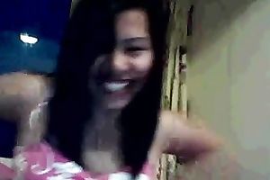 My raven haired Asian girlfriend undresses for me on cam