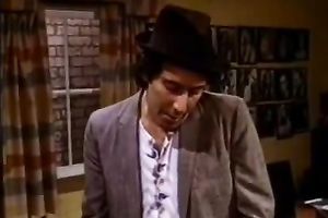 Bosomy blond gives her paramour a great oral stimulation right in his office