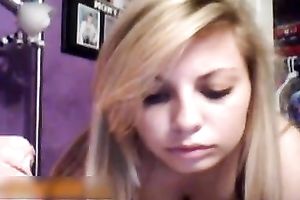 Blonde legal age teenager shows her body and fingers her smooth pussy