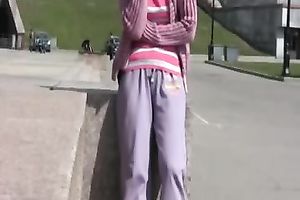 Slim redhead Sveta pees in her panties in a public place