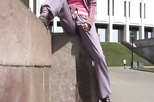 Slim redhead Sveta pees in her panties in a public place