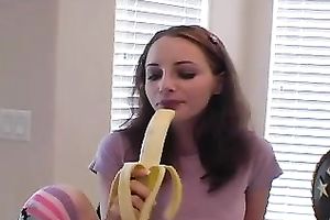 Teen honey eats banana as if it is a juicy clean 10-Pounder