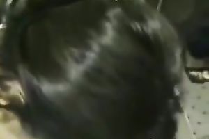 Buxom slut with jet dark hair gives head in the changing room