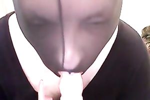 Amateur doxy wearing a mask sucks a toy in web camera solo movie