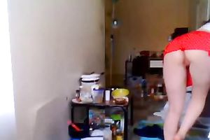 Teenage pippin in red miniskirt exposes her round wazoo on web camera