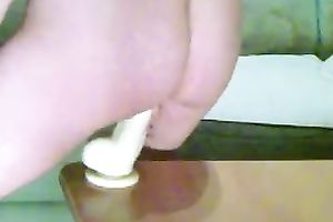 I am riding my favourite suction cup dildo on a table