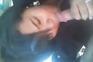 Raunchy looking Asian floozy sucks my jock right in my car