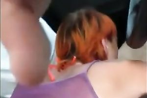 Insatiable redhead slut enjoys engulfing my weenie in a car