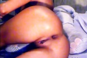 Oiled up brunette hair bombshell bonks her ass with large anal sex toy