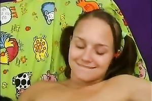 Two legal age teenager lesbo beauties polish their twats and play with fake penis