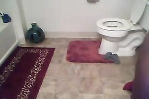 Webcam solo with a pretty swarthy white wife getting nasty in the bathroom
