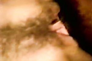 Tall and leggy charmer acquires her curly muff stretched out on the table