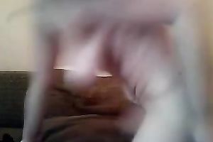 Freaky white cougar wench on cam stripteases and masturbates