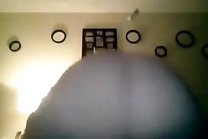 Amateur ebon sweetheart shakes her large booty in front of a webcam