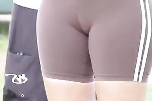 Two sporty angels flash their cameltoe in the street