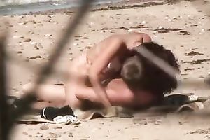 Sexy redhead girlfriend happy her boyfriend on the beach