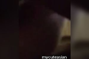 Homemade movie scene with dilettante Asian pair banging in the missionary pose