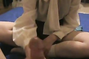 College Married slut wearing a blouse massages my prick in POV clip