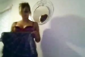 This sexy cam model in plaid petticoat will receive your dick hard in no time