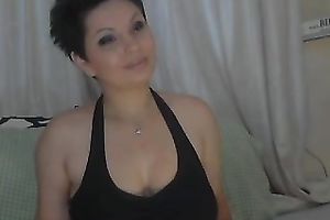 Short haired web camera model with large boobies can't live without fooling around