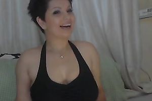 Short haired web camera model with large boobies can't live without fooling around