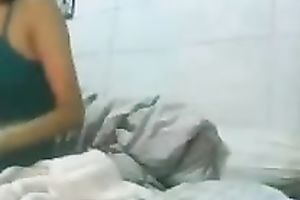 Sweet Asian kinky wife is taking off her raiment on web camera