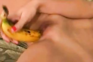 Pigtailed Japanese hoe stuffs her love tunnel with banana