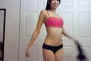 Shapely Asian web camera legal age teenager gives awesome striptease show