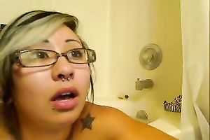 Curvy tattooed Thai honey in glasses masturbates in bathtub - cam