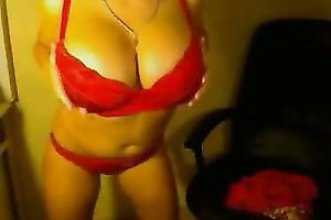 My red-haired girlfriend with large boobs likes masturbating on web camera