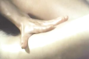 Brunettes with oiled bodies make out and finger cunts indoors