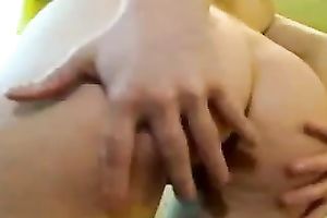 Redhead hussy shows her vagina for the web camera and stuffs it with something