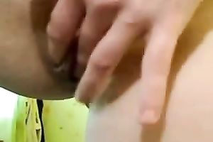 Redhead hussy shows her vagina for the web camera and stuffs it with something