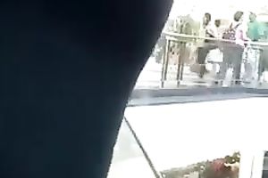 This bootyful charmer in tight leggings is sexy as hell