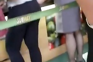 This bootyful charmer in tight leggings is sexy as hell