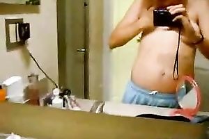 Mirror solo video with an non-professional slutwife playing with her fine meatballs