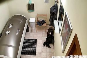 Torrid unshaved blondie tanning her lovely body in solarium