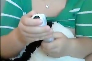 Chubby cam model tickles her vagina with her favourite sex toy