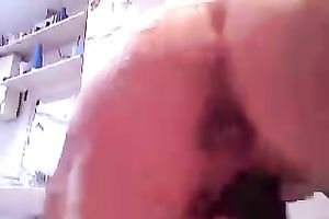 Aunt acquires lustful in bathroom and masturbates using soap and her toy