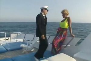 Seductive large boobed blondie has a wild sex on the yacht