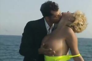 Seductive large boobed blondie has a wild sex on the yacht