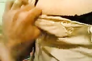 Squeezing my girlfriend's swollen teats in front of a camera