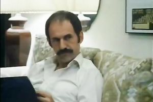 Mature guy with majestic mustache eats a glamorous dark brown