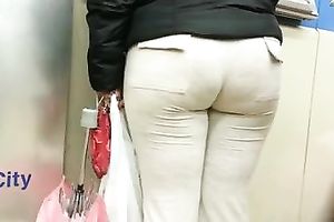 Big-assed woman receives caught on my hidden cam in a shop